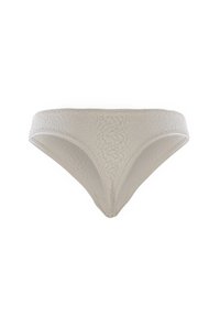 String en dentelle beige clair avec un motif floral texturé, une taille lisse et une coupe basse conçue pour une couverture minimale.
