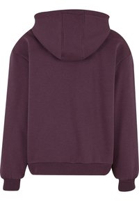 Haut à capuche bordeaux avec cordon de serrage, poignets et ourlet côtelés, et une texture douce et lisse. Vue arrière sans motifs ni logos visibles.