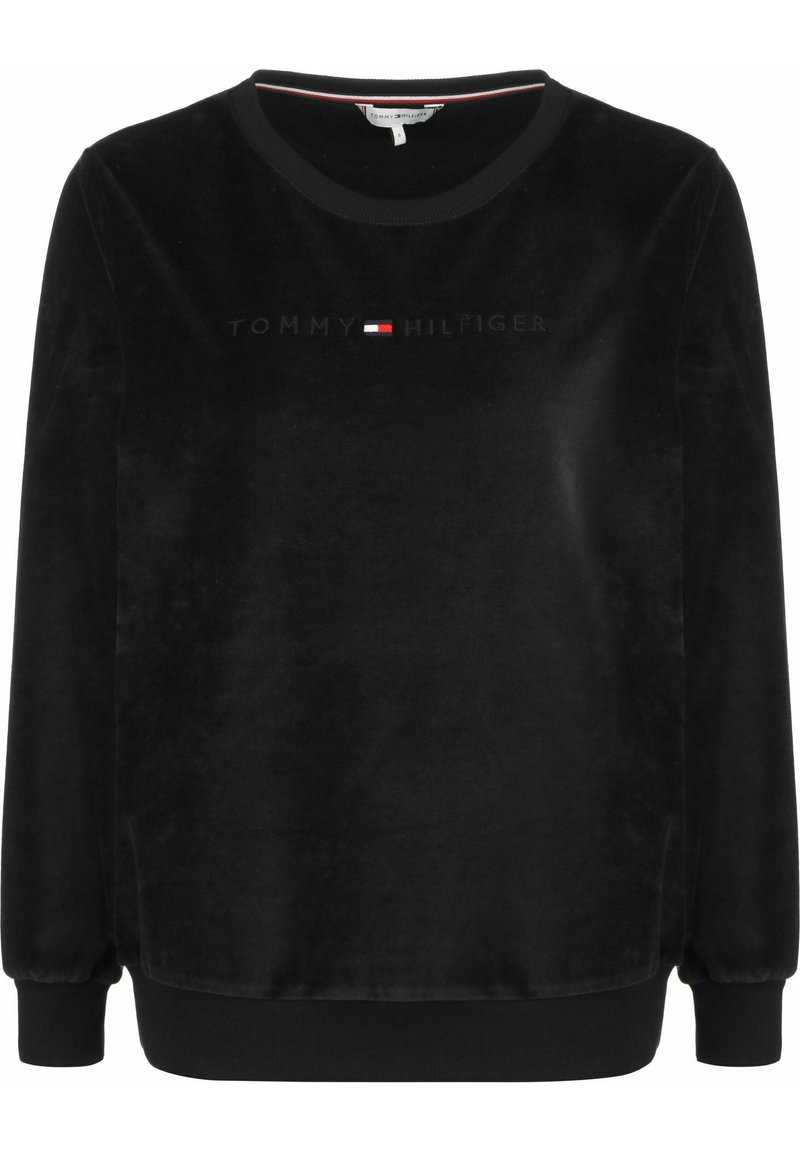 Felpa in velluto nero con collo tondo, polsini e orlo a costine. Logo "TOMMY HILFIGER" mostrato in testo tonale sulla parte anteriore.