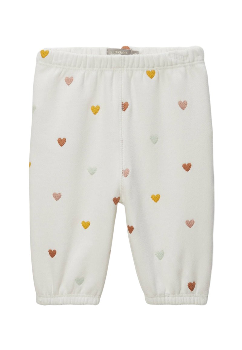 Pantalons blancs pour bébé avec taille élastique et poignets, décorés de petits motifs en forme de cœur en jaune, rose, marron et vert clair.