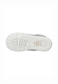 White sneaker with a textured, light gray mesh upper. Features a white rubber outsole with ventilation holes and embossed logo detailing.
