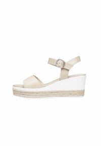 Beige leren wedge sandaal met een verstelbare band, een ronde neusontwerp en een natuurlijke jute-wrijving platform. Witte rubberen zool.