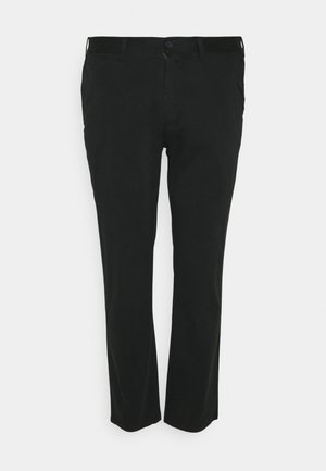 Sorte bomuldsbukser med lige ben-design, der har lynlås i front, knaplukning og sidelommer. Glat tekstur, minimalistisk stil.