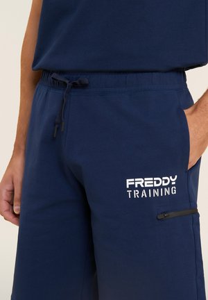 Freddy, SHORTS CON STAMPA "TRAINING" E TASCA ZIP - Pantalón corto de deporte - blue