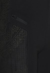 Desigual Legging (type pantalon) - black