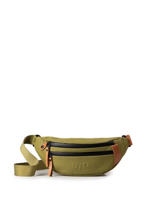 Fanny pack in olive green material with a smooth texture, two black zippers, tan leather accents, and an embossed logo on the front.