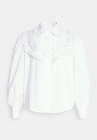 Camicia bianca con maniche a sbuffo, caratterizzata da un colletto rifinito in pizzo e delicate ricami, realizzata in morbido cotone.
