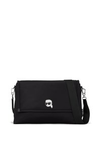 Borsa a tracolla in nylon nero con chiusura a linguetta magnetica, caratterizzata da un patch con un personaggio dei cartoni, tracolla regolabile e dettagli in metallo argentato.