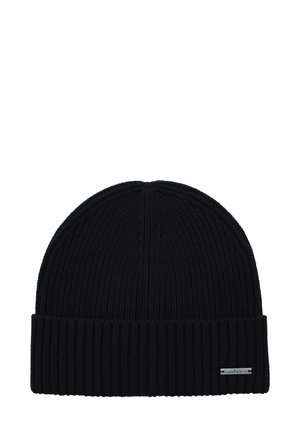 Czarna dzianinowa czapka beanie z prążkowaną fakturą i podwiniętym mankietem. Posiada małą metalową metkę z logo z boku.