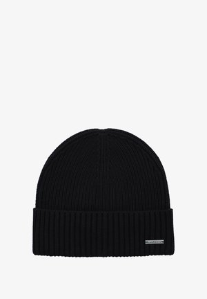 Czarna dzianinowa czapka beanie z prążkowaną fakturą i podwiniętym mankietem. Posiada małą metalową metkę z logo z boku.