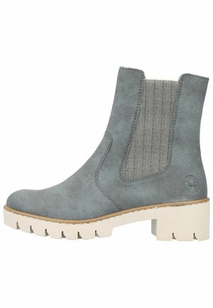 Bottine en daim gris avec semelle épaisse blanche, panneau latéral élastique à motif et talon bloc bas.