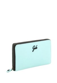 Portafoglio in pelle verde menta con chiusura a zip, caratterizzato da un logo nero sul davanti e da un bordo della cerniera in contrasto nero. Texture liscia.