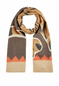 Écharpe beige avec un motif abstrait marron, un accent en zigzag orange et une texture douce. Convient pour le superposition et la chaleur.