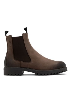 Brązowe skórzane botki Chelsea z elastycznymi panelami bocznymi, teksturowanym wykończeniem, wzmocnionym czubkiem i solidną podeszwą zapewniającą przyczepność.
