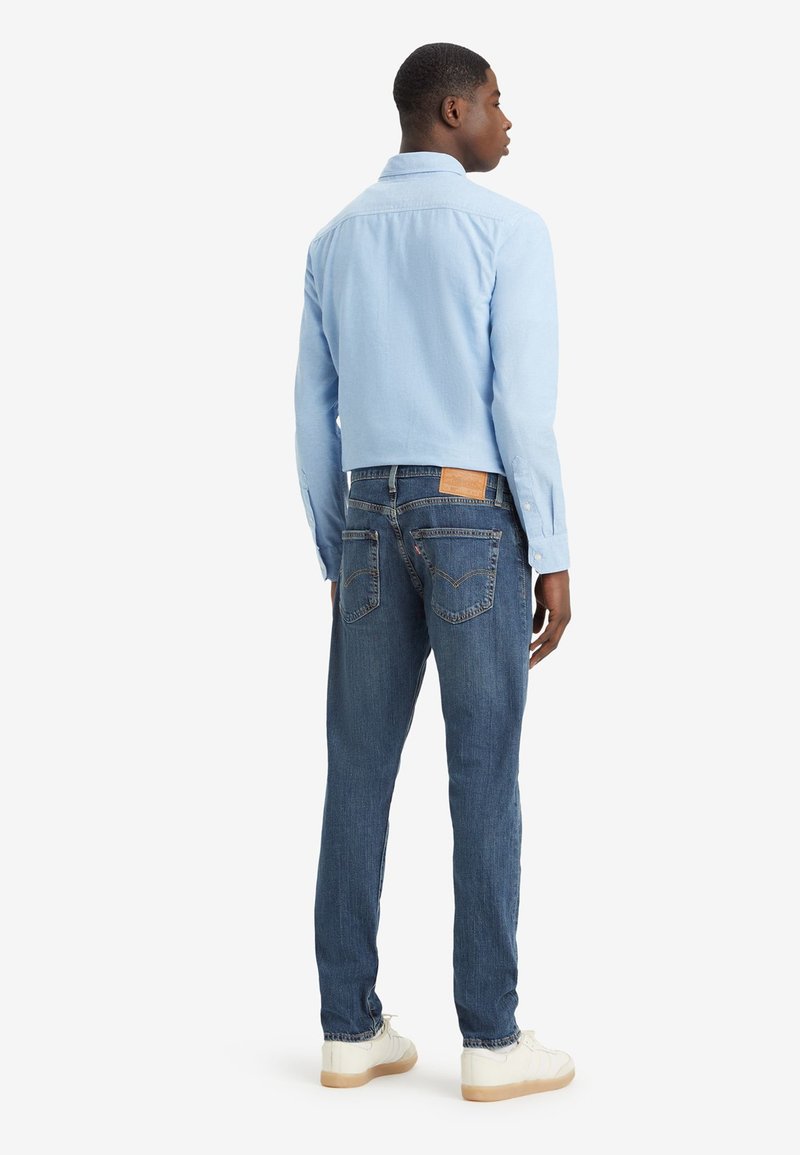 Levi's® 512® SLIM TAPER - Džíny Straight Fit - dark blue denim