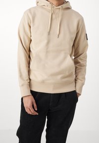 Calvin Klein Jeans Jersey con capucha - beige