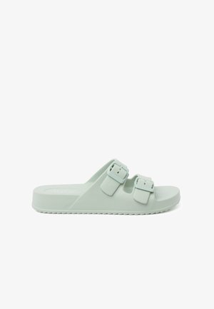 Lys grønne gummislidesandaler med to justerbare spænder, tekstureret overdel og en flad, ribbet sål for godt greb.