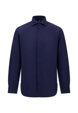 Námořnická modrá dlouhá halenka z hladké látky, s klasickým límcem, zapínáním na knoflíky a zaobleným lemem s prošíváním.