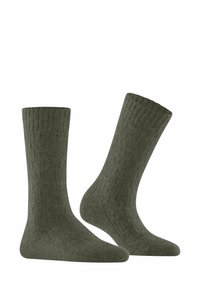 Wollsocken in dunklem Grün mit einem strukturierten, gerippten Design. Sie haben eine Crew-Länge und eine glatte, weiche Oberfläche.
