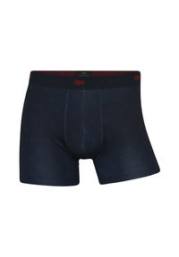 Marineblå boxer shorts med en tætsiddende pasform, der har et kontrasterende mørkerødt cirkulært mønster og et sort elastisk bånd med branding.