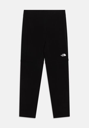 Pantalones deportivos negros con cintura elástica, bolsillos laterales y un logo blanco en la parte inferior de la pierna. Tejido suave y diseño ajustado.