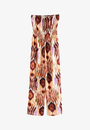 Maksi kombinezon iz tkanine z ubutimi, ki se ponaša z barvitim ikat vzorcem. Oblikovanje vključuje smocked zgornji del, brez naramnic in široke hlače.