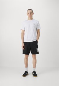 EA7 Emporio Armani Pantaloni sportivi - nero