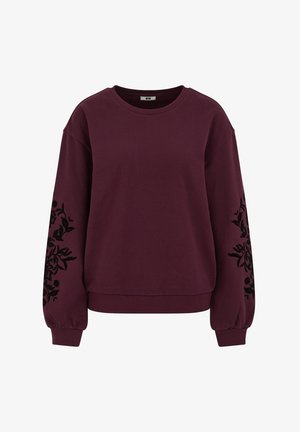 Felpa bordeaux con maniche lunghe e voluminosi. Presenta ricami floreali neri sulle maniche. Tessuto morbido con design a collo rotondo.