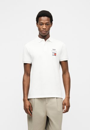 Tommy Hilfiger TH X CADILLAC FORMULA 1 TEAM LOGO UNISEX - Polo majica - white