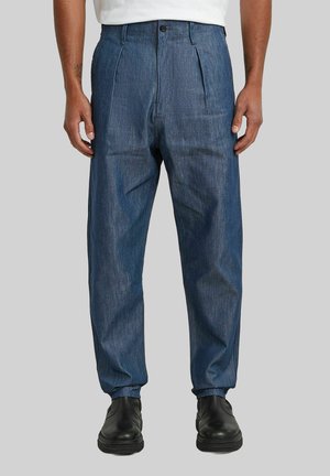PLEATED - Relaxed fit jeans - raw denim