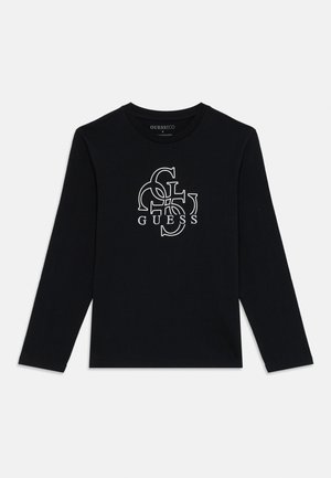 Schwarzes Langarmshirt mit weißen überlappenden Buchstaben G, U, E, S, S, die auf der Vorderseite zentriert sind, und dem Text "GUESS" unterhalb der Grafik.