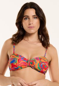 Barvna bikini zgornji del z drznimi cvetličnimi motivi v roza, oranžni, zeleni in modri barvi. Vključuje tanke nastavljive naramnice in čelo z vozlom.