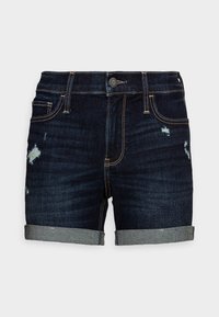 Pantalones cortos de mezclilla oscura con un diseño desgastado, dobladillos con vuelta y costuras doradas en contraste. Cuenta con bolsillos delanteros y cierre de botón.