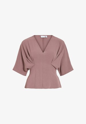 Blouse mauve à manches courtes avec col en V, détails plissés à la taille et ourlet légèrement évasé.