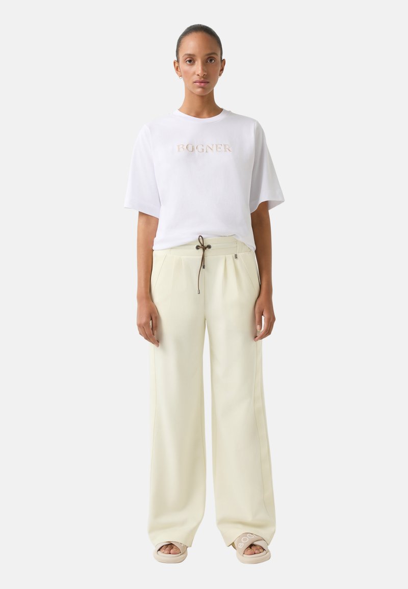 Bogner FILIA Tracksuit bottoms vanille/yellow Zalando