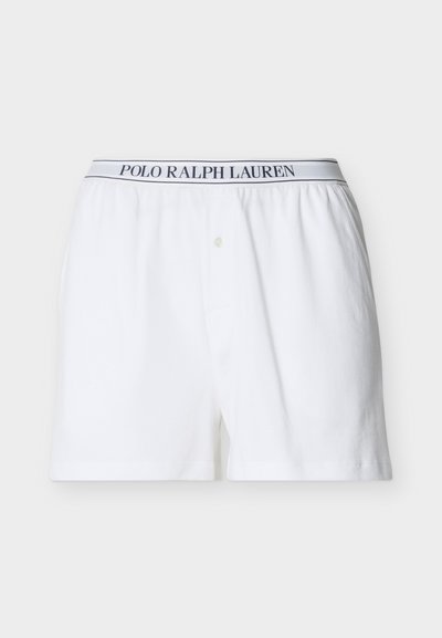 Άσπρα ανδρικά μποξεράκια με κουμπωτό μπροστινό μέρος και ελαστική μέση με την ετικέτα «Polo Ralph Lauren» σε ναυτικό μπλε χρώμα.