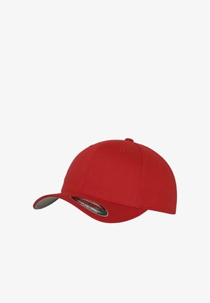 Red baseball cap with a curved visor, made of fabric. Features a smooth texture and a black size tag under the brim.