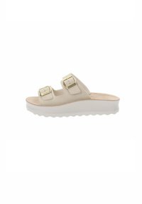 Sandalo slide beige con due cinturini regolabili, parte superiore in morbido tessuto e suola platform con bordo ondulato.