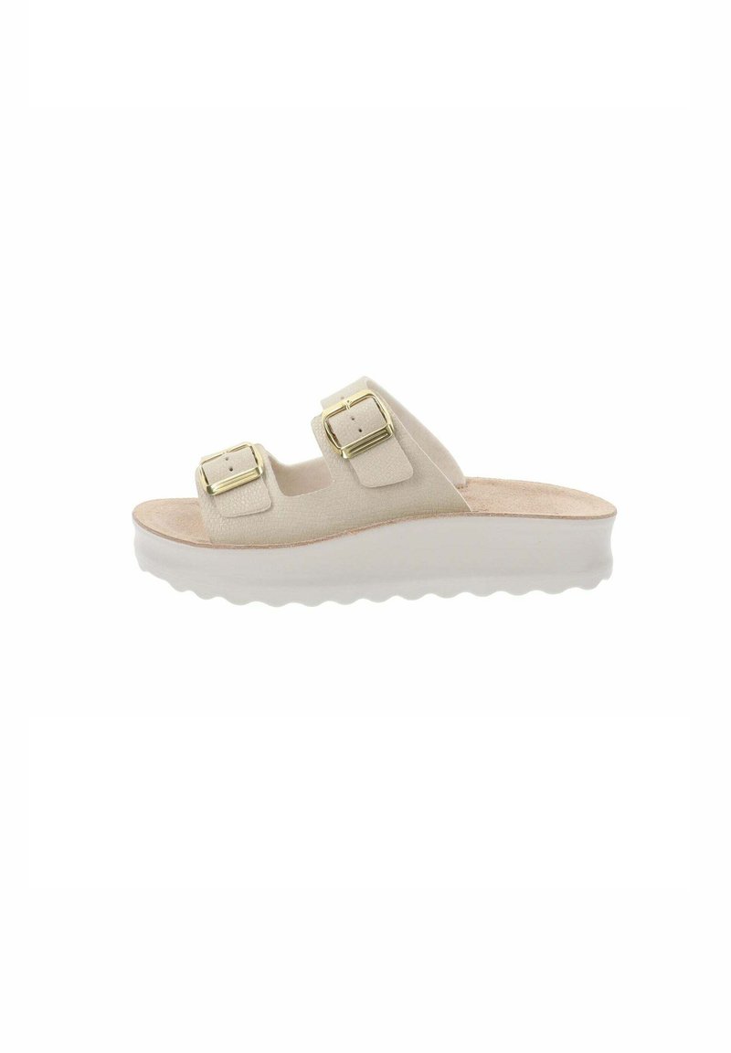 Sandalo slide beige con due cinturini regolabili, parte superiore in morbido tessuto e suola platform con bordo ondulato.