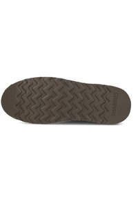 Bruine rubberen schoenenzool met een zigzagpatroon en een gestructureerde afwerking. Het "SHABBIES"-logo is in de rechterbenedenhoek geperst.