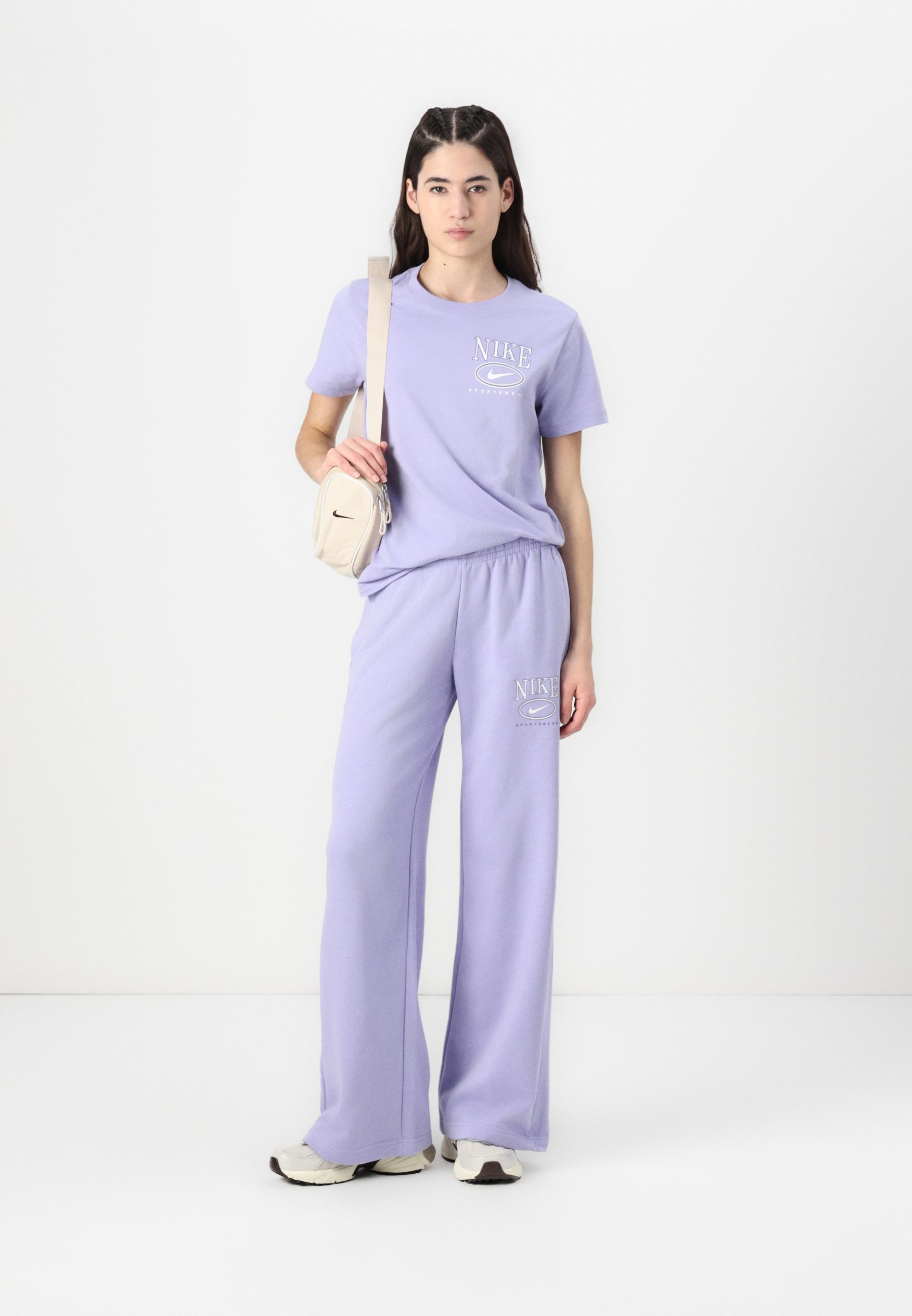 purple nike tracksuit womens