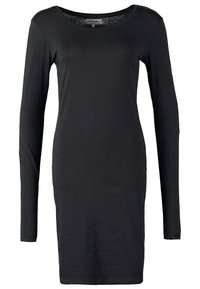 Robe noire à manches longues avec un col rond, fabriquée dans un tissu lisse avec une silhouette ajustée, atteignant la longueur mi-cuisse.