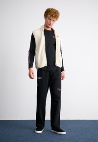 Ellesse QUINZANO - Ilgarankovis viršutinės dalies drabužis - black