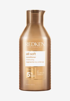 Moisturizing Redken All Soft conditioner bottle for dry, brittle hair with argan oil and 5% moisture complex, 500ml capacity.
