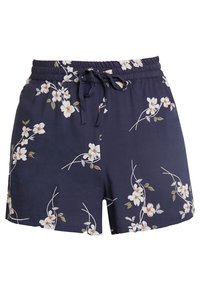 Navy shorts with a floral pattern featuring white flowers and green leaves. Elastic waistband with a drawstring, made of lightweight fabric.