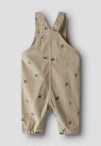 Beige katoenen tuinbroek met verstelbare banden en elastische boorden, versierd met verspreide kleurrijke tractorprints.