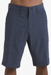 Marineblaue Shorts aus strukturiertem Stoff mit Knopfverschluss, Gürtelschlaufen und Seitentaschen. Bietet eine taillierte Passform und endet knielang.