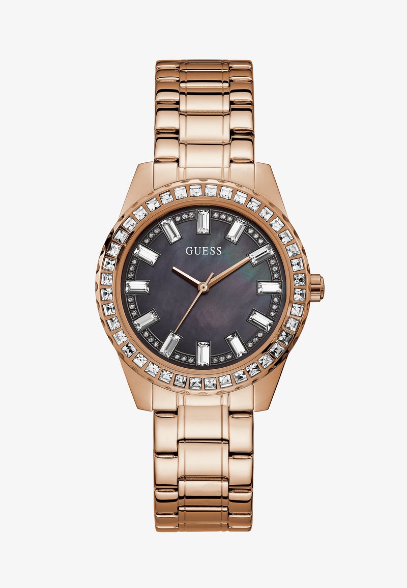 Roségold Metallarmbanduhr mit rundem Ziffernblatt, schwarzem Zifferblatt, kristallenen Akzenten und auffälligen Stundenmarkierungen. Verfügt über ein verbundenes Armbanddesign.