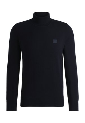 Maglione a collo alto blu navy realizzato in morbido materiale knit, con maniche lunghe e colletto a costine. Include un patch quadrato con logo sul petto.