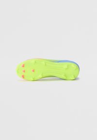 Soccer cleat with a flexible, neon yellow outsole featuring triangular studs, accent colors of pink and blue, and textured surface details.